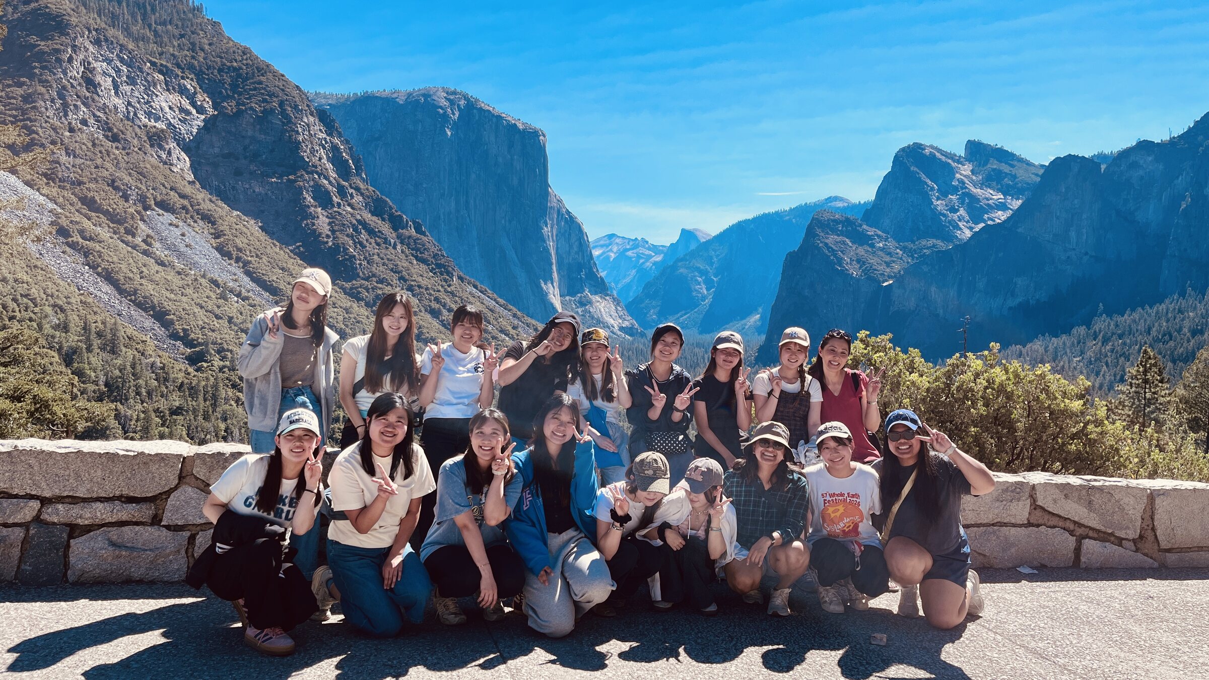 ISMP students and mentors at Tunnel View in Yosemite, with El Capitan and Half Dome behind them